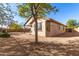 Side view of house with desert landscaping at 29715 N 119Th Ln, Peoria, AZ 85383