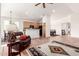 Open concept living room with access to kitchen and dining area at 29715 N 119Th Ln, Peoria, AZ 85383