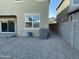 Backyard view with AC unit and fence at 35262 W San Ildefanso Ave, Maricopa, AZ 85138