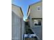 View of the house from the backyard, showing a garden at 35262 W San Ildefanso Ave, Maricopa, AZ 85138