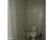 Clean bathroom with toilet and small trash can at 35262 W San Ildefanso Ave, Maricopa, AZ 85138