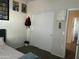 Bedroom with double bed, closet and adjacent hallway at 35262 W San Ildefanso Ave, Maricopa, AZ 85138