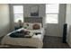Comfortable bedroom with a bed and window at 35262 W San Ildefanso Ave, Maricopa, AZ 85138