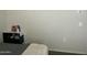 Bedroom with nightstand and wall-mounted power outlets at 35262 W San Ildefanso Ave, Maricopa, AZ 85138