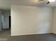 Spacious bedroom with ceiling fan and large wall at 35262 W San Ildefanso Ave, Maricopa, AZ 85138