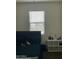 Bedroom with double bed, window blinds, and shelving unit at 35262 W San Ildefanso Ave, Maricopa, AZ 85138