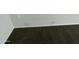 Dark-colored carpet in bedroom with some wall blemishes at 35262 W San Ildefanso Ave, Maricopa, AZ 85138