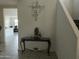 Entryway with console table and view into dining area at 35262 W San Ildefanso Ave, Maricopa, AZ 85138