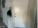 Hallway with coat rack and door to another room at 35262 W San Ildefanso Ave, Maricopa, AZ 85138
