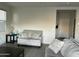 Living room with couch and side table at 35262 W San Ildefanso Ave, Maricopa, AZ 85138