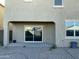 Covered patio with sliding glass doors at 35262 W San Ildefanso Ave, Maricopa, AZ 85138