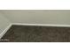 Image shows a wall and carpeted floor at 35262 W San Ildefanso Ave, Maricopa, AZ 85138