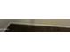 Shows a section of baseboard and carpet at 35262 W San Ildefanso Ave, Maricopa, AZ 85138