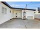 Backyard with concrete patio and exterior access to home at 3538 W Chambers St, Phoenix, AZ 85041