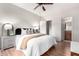 Main bedroom features a comfortable bed and ample closet space at 3830 E Lakewood E Pkwy # 2154, Phoenix, AZ 85048