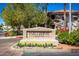 Attractive Portofino Condominium entrance sign with landscaping at 3830 E Lakewood E Pkwy # 2154, Phoenix, AZ 85048