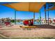 Community playground with shade structures and play equipment at 3830 E Lakewood E Pkwy # 2154, Phoenix, AZ 85048