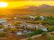 Aerial sunset view of the house and surrounding area at 4090 E Galvin St, Cave Creek, AZ 85331