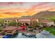 Luxury home with pool and expansive backyard during sunset, mountain views at 4090 E Galvin St, Cave Creek, AZ 85331