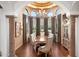 Elegant dining room with hardwood floors and large windows at 4090 E Galvin St, Cave Creek, AZ 85331