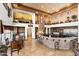 Impressive kitchen with stone breakfast bar, high ceilings, and ample seating at 4090 E Galvin St, Cave Creek, AZ 85331