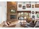 Spacious living room showcases a stone fireplace and access to the backyard patio at 4090 E Galvin St, Cave Creek, AZ 85331
