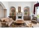 Elegant living room with a fireplace and custom cabinetry at 4090 E Galvin St, Cave Creek, AZ 85331