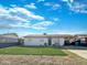Updated single-story home with a landscaped lawn and carport at 4121 W Alta Vista Rd, Phoenix, AZ 85041