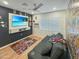 Game room with a comic book wall and comfortable seating at 4121 W Alta Vista Rd, Phoenix, AZ 85041