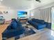 Living room features a fireplace and comfortable sectional sofa at 4121 W Alta Vista Rd, Phoenix, AZ 85041