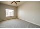 Bright bedroom with large window and neutral carpeting at 5450 E Deer Valley Dr # 4201, Phoenix, AZ 85054