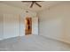 Bedroom with double doors leading to office space at 5450 E Deer Valley Dr # 4201, Phoenix, AZ 85054