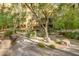 Landscaped courtyard with seating and fireplace at 5450 E Deer Valley Dr # 4201, Phoenix, AZ 85054
