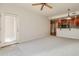 Bright living room features neutral carpeting and patio access at 5450 E Deer Valley Dr # 4201, Phoenix, AZ 85054