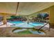 Community pool and spa with covered seating areas at 5450 E Deer Valley Dr # 4201, Phoenix, AZ 85054