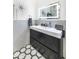 Modern bathroom with hexagon floor tile and floating vanity at 5701 E Hedgehog Pl, Scottsdale, AZ 85266