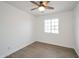 Spacious bedroom with wood-look floors and ceiling fan at 6249 S Parkside Dr, Tempe, AZ 85283