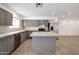 Modern kitchen with gray cabinets, concrete countertops, and stainless steel appliances at 6249 S Parkside Dr, Tempe, AZ 85283