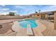 Relaxing kidney-shaped pool with diving board at 6249 S Parkside Dr, Tempe, AZ 85283