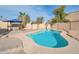 Inviting kidney-shaped pool with a surrounding patio and a shaded pergola area at 6249 S Parkside Dr, Tempe, AZ 85283