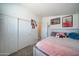 Bedroom with double bed and plenty of closet space at 6722 W Taylor St # 294, Phoenix, AZ 85043