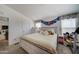 Large main bedroom with king-size bed, offering a tranquil atmosphere at 6722 W Taylor St # 294, Phoenix, AZ 85043
