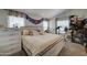 Main bedroom with king-size bed and large window, offering a bright and airy feel at 6722 W Taylor St # 294, Phoenix, AZ 85043
