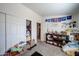 Bedroom with shelving unit and decorative wall accents at 6722 W Taylor St # 294, Phoenix, AZ 85043