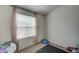 Bright bedroom with large window and exercise ball at 6722 W Taylor St # 294, Phoenix, AZ 85043