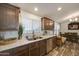 Kitchen with double sink, wood cabinets, and dishwasher at 6722 W Taylor St # 294, Phoenix, AZ 85043