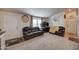Living room with leather couches, and a home office at 6722 W Taylor St # 294, Phoenix, AZ 85043
