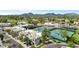 Community view with tennis courts and mountain backdrop at 7710 E Gainey Ranch Rd # 241, Scottsdale, AZ 85258