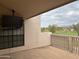 Relaxing balcony with a view of a golf course and mounted TV at 7800 E Lincoln Dr # 2047, Scottsdale, AZ 85250