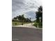 Community entrance with gate and signage surrounded by lush landscaping at 7800 E Lincoln Dr # 2047, Scottsdale, AZ 85250